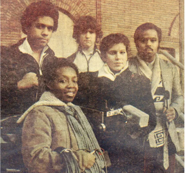 Old photo (likely 70s) of a group of mixed race youngsters and video equipment.